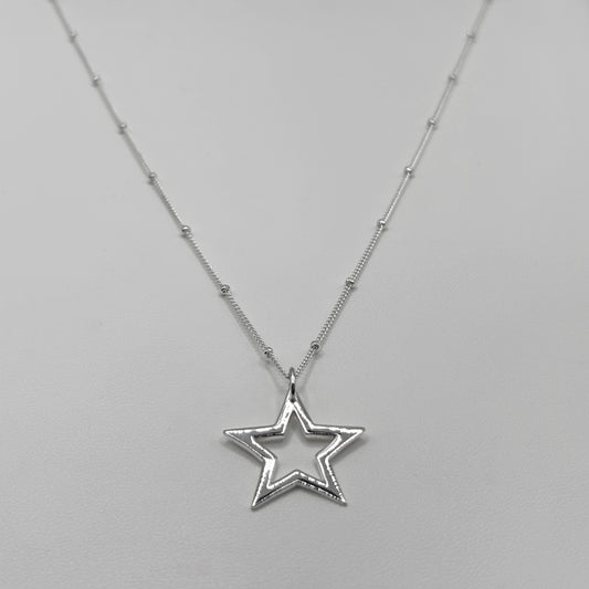 Cut-Out Star Pendant on a Satellite Necklace