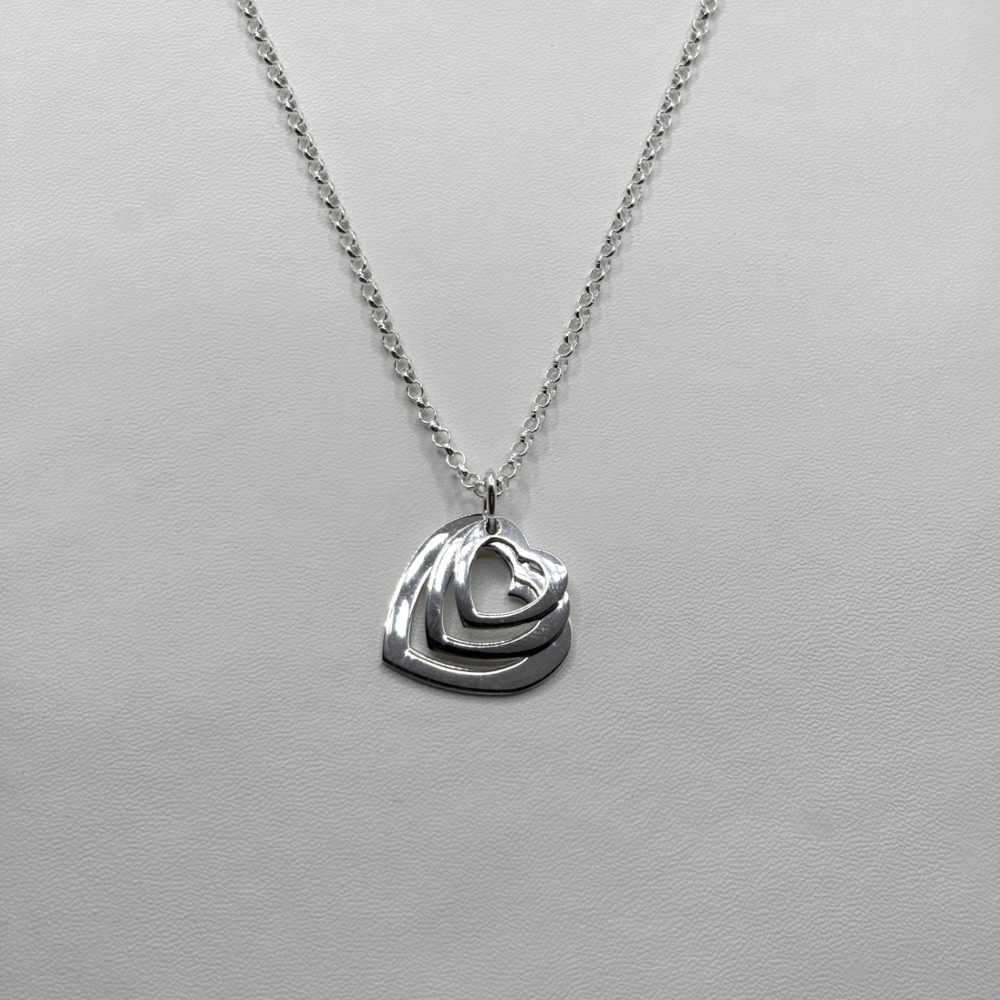 Triple Heart Pendant on a Classic Necklace