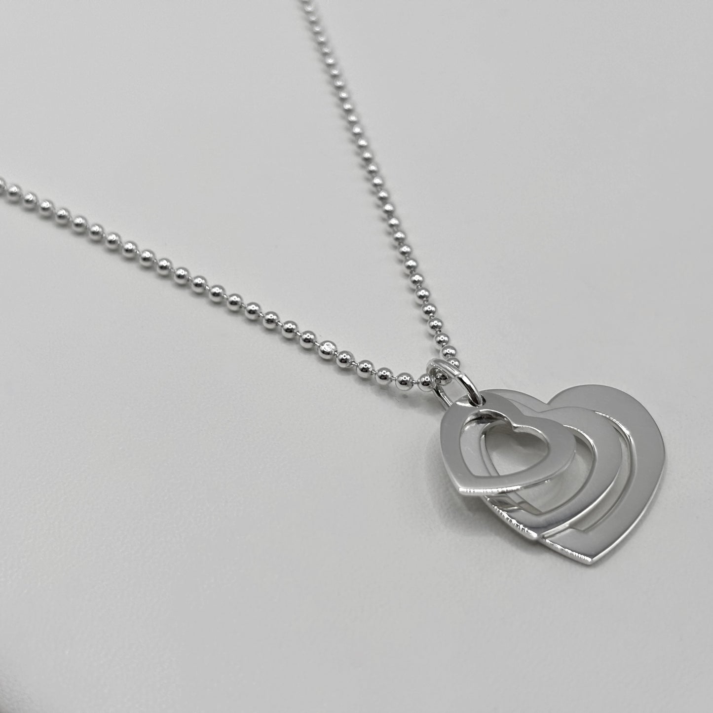 Triple Heart Pendant on a Bead Necklace
