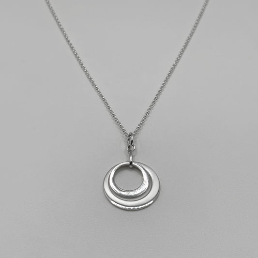 Two Ring Pendant on a Fine Classic Necklace