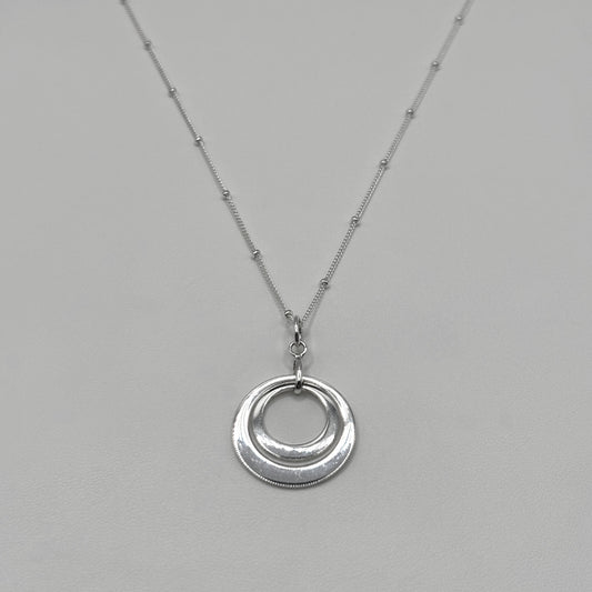 Two Ring Pendant on a Satellite Necklace