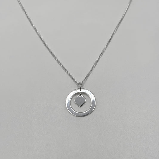 Ring and Heart Pendant on a Fine Classic Necklace