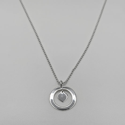 Ring and Heart Pendant on a Bead Necklace
