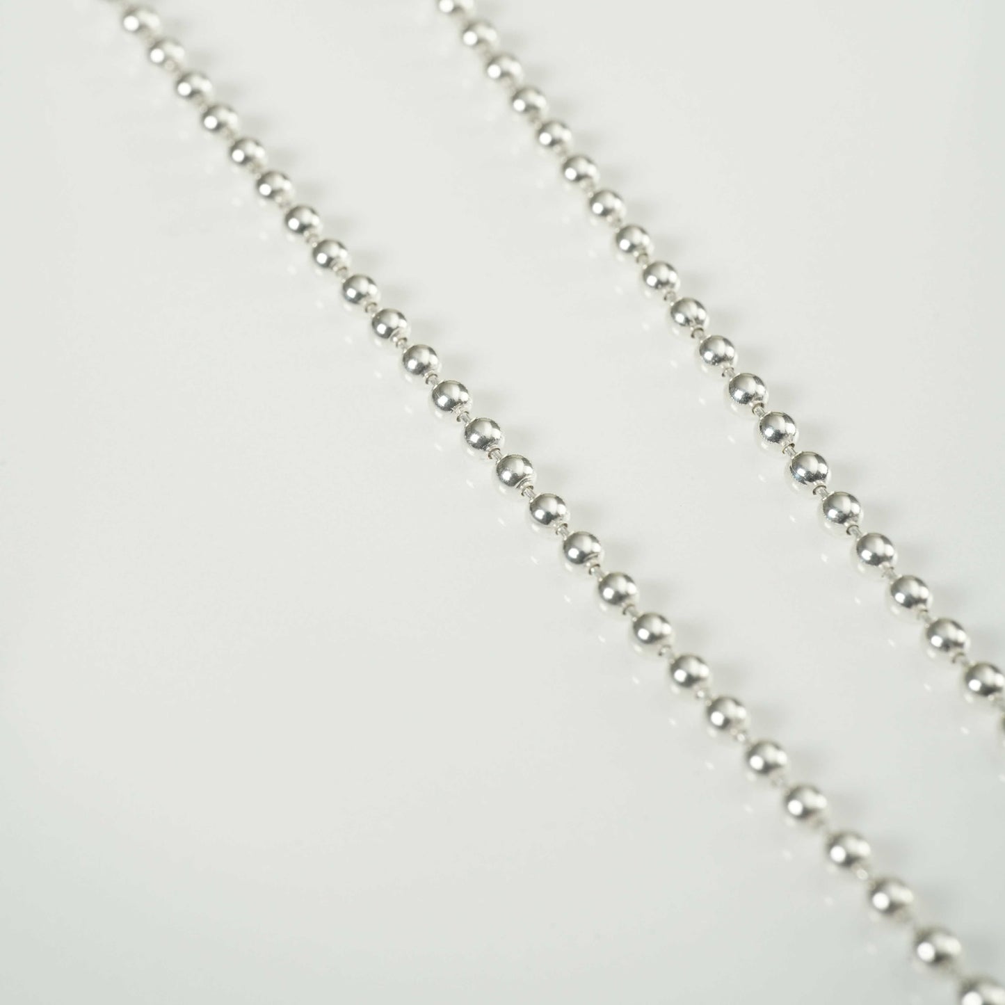 Triple Heart Pendant on a Bead Necklace