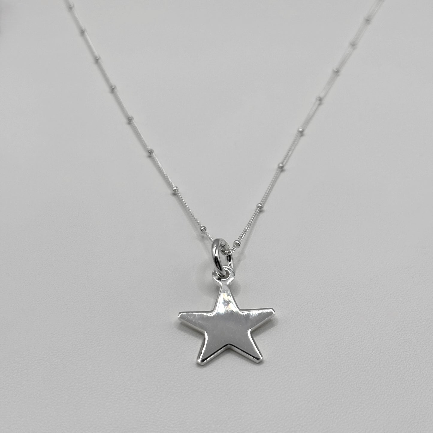 Star Pendant on a Satellite Necklace