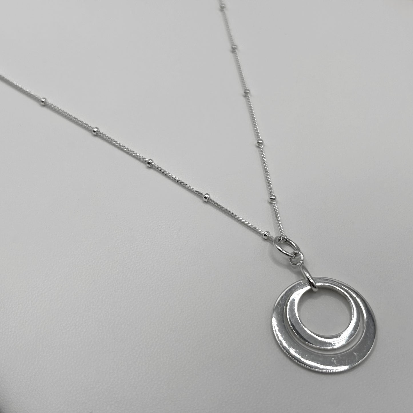 Two Ring Pendant on a Satellite Chain