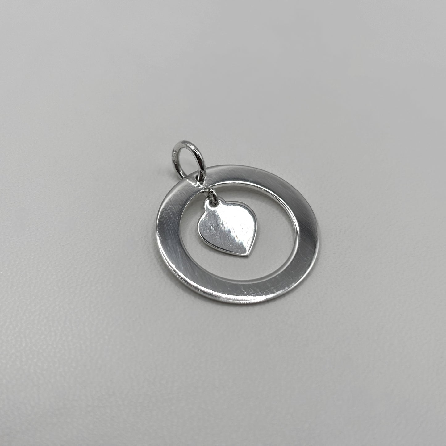Ring and Heart Pendant on a Fine Classic Necklace