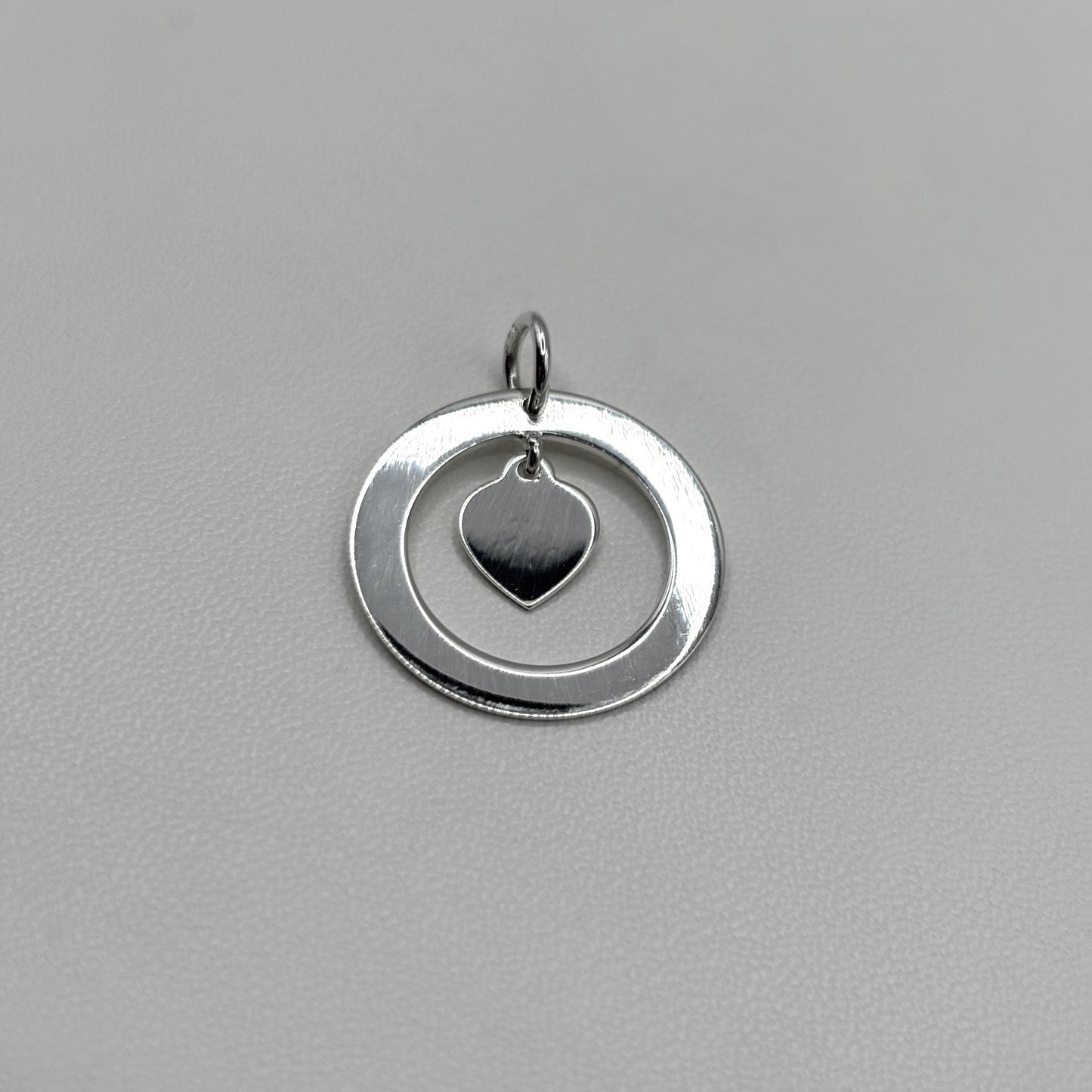 Ring and Heart Pendant on a Fine Classic Necklace