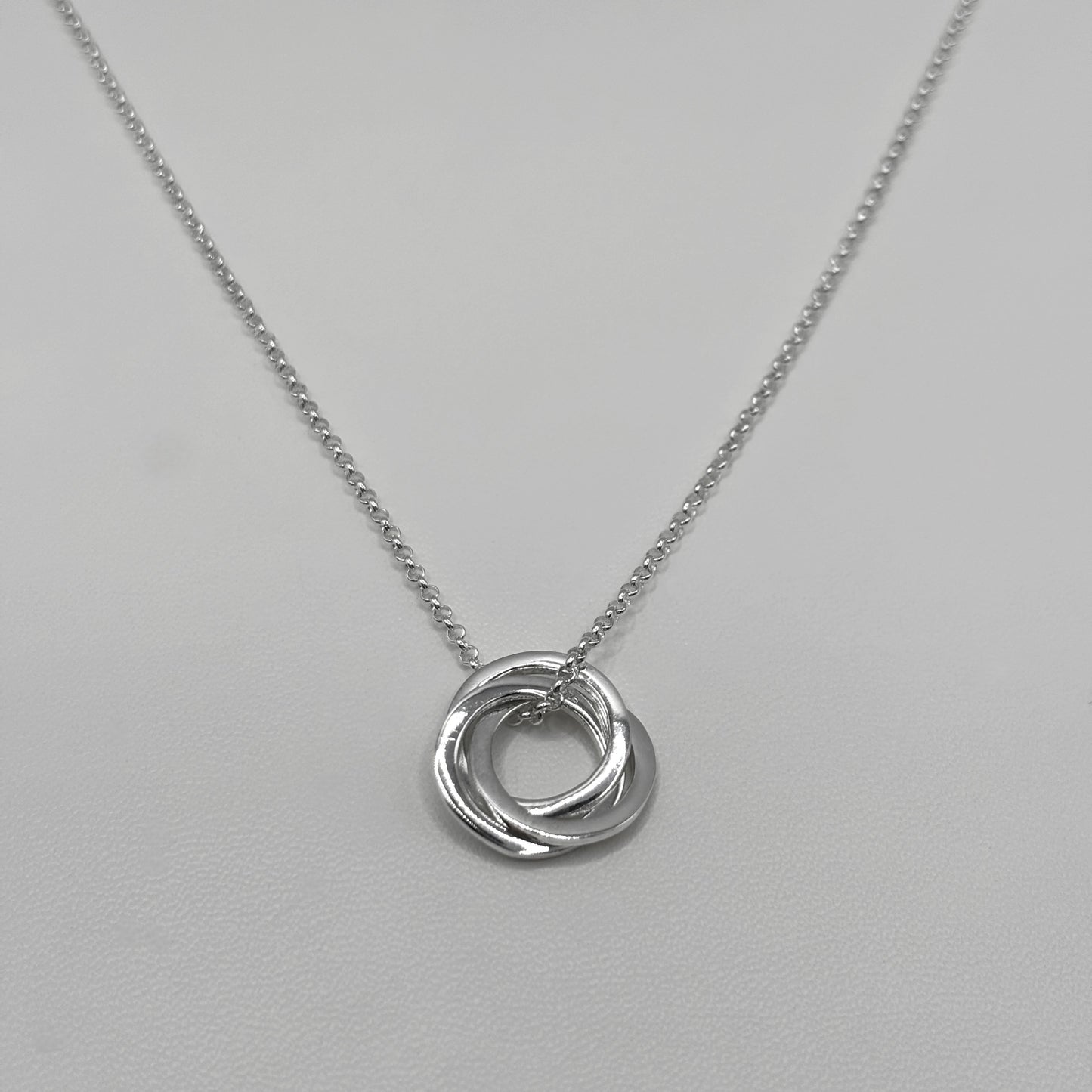 Three Ring Pendant on a Fine Belcher Chain