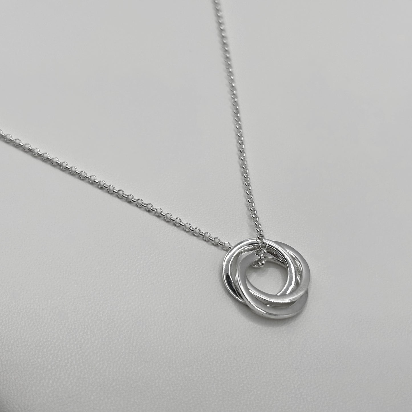Three Ring Pendant on a Fine Belcher Chain