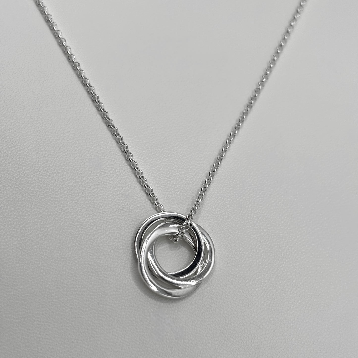 Three Ring Pendant on a Fine Belcher Chain