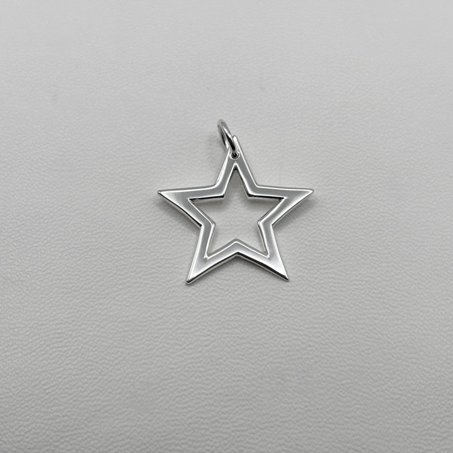 Cut-Out Star Pendant on a Satellite Chain